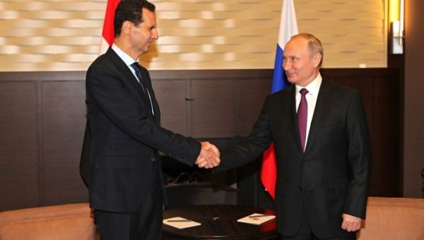President Putin greeting his homolog, President  Al-Assad. 