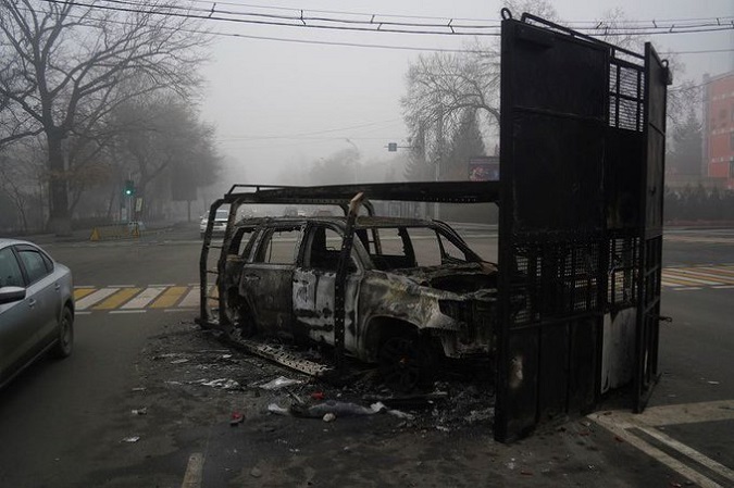 Burnt-out riot special Vehicle in Almaty.