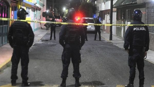 Policemen custody crime scene, Tijuana, Mexico, Jan.17, 2022.