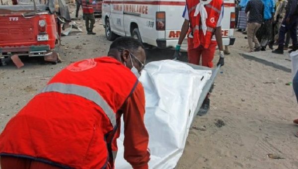 Paramedics at the site of the suicide bombing, Mogadishu, Somalia, Jan. 18, 2022.