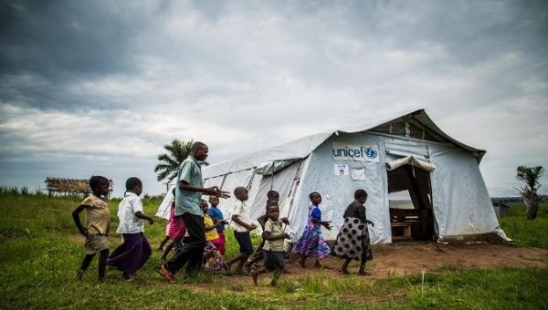 Children being escorted in UNICEF displaced persons camp in the DRC. Jan. 30, 2022.