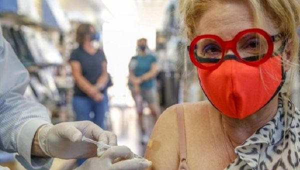 A woman gets a COVID-19 vaccine, Los Angeles, U.S., Nov. 2021. 