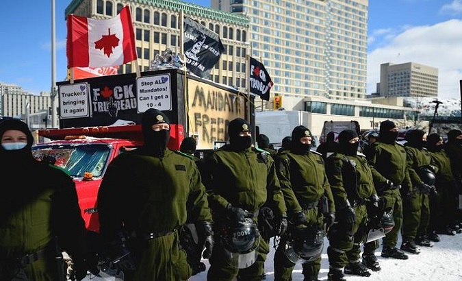 Ottawa police to end the blockade by the trucker's convoy. Feb. 18, 2022.