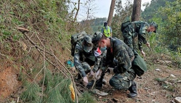 China's rescue teams are combing the heavily forested hillsides in the south of the country where the plane crash occurred. March. 24, 2022. 