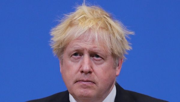 British Prime Minister Boris Johnson reacts during a press conference at NATO headquarters in Brussels, Belgium, Feb. 10, 2022.