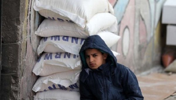 A Palestinian child at a UN food aid distribution center, Gaza City, March 16, 2022.