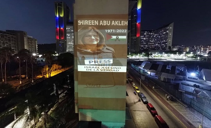 Projection of Shirin Abu Akleh's image, Caracas, Venezuela, May 15, 2022.