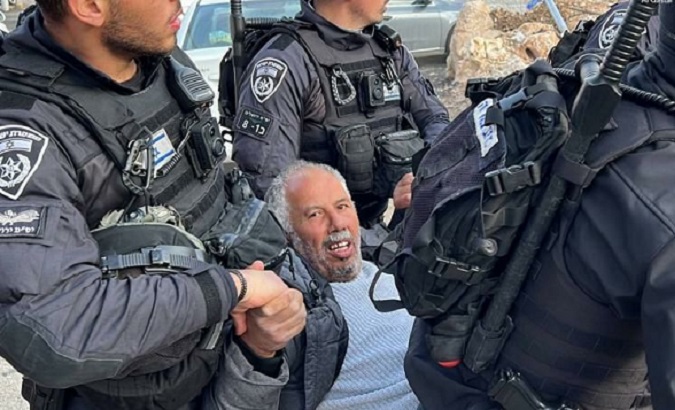 Israeli occupation forces arrest Palestinian activist Mohammed Abo Al-Hummus, Jerusalem, May 26, 2022.