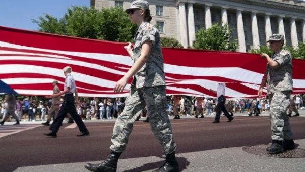 People take part in the Memorial Day parade in Washington, D.C., the United States, on May 30, 2022.