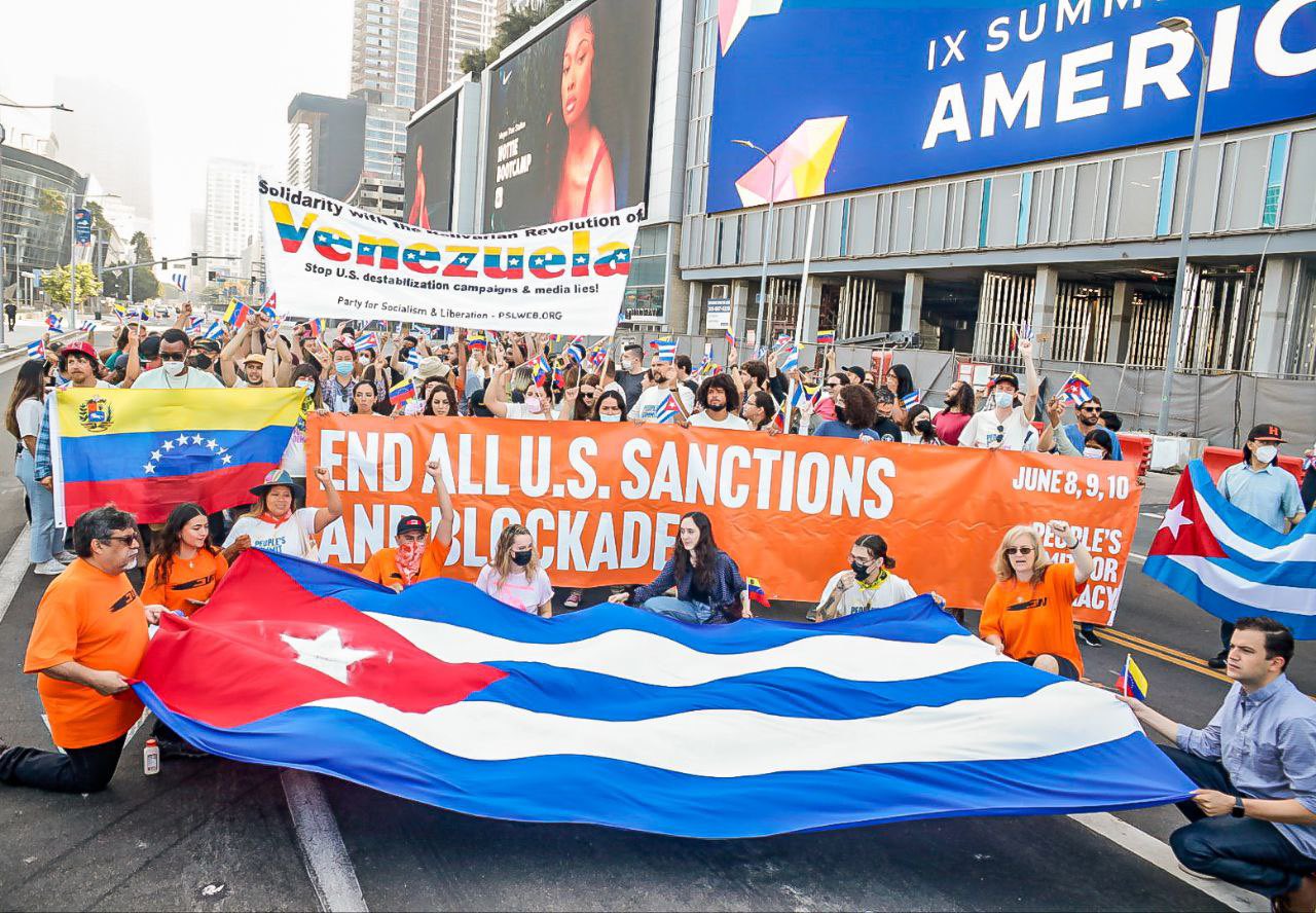 Large crowds protesting against exclusion at the Summit of the Americas
