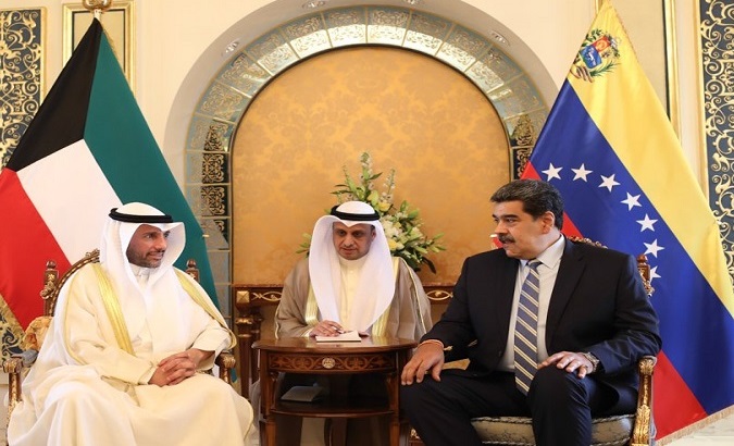 Venezuela's President Nicolas Maduro (R) & Kuwait's National Assembly President Marzouq Al-Ghanim (L).