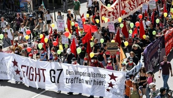 Fight climate change: Germany protestors urges G7 to do more for the planet.