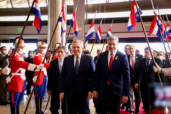 The President of Argentina, Alberto Fernández (c), together with the Paraguayan President Mario Abdo Benítez (r), arrives at the Summit of Heads of State of Mercosur and Associated States, today, in Luque (Paraguay).