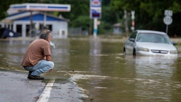 Kentucky floods leave at least 15 dead, Biden declares disaster area.