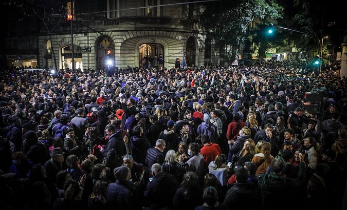 Citizens express their support for Cristina Fernandez-Kirchner outside her residence, Buenos Aires, Aug. 25, 2022.