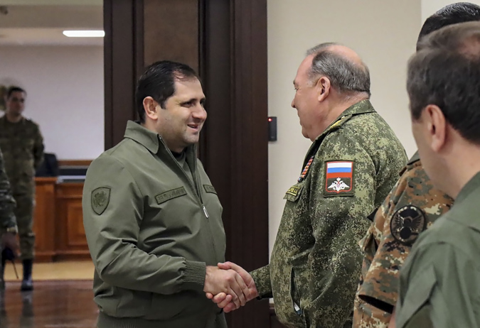 A handout photo made available by the Russian Defence ministry press-service on 19 September 2022 shows Defense Minister of Armenia Suren Papikyan (?) meets with he head of the advance group of the CSTO mission in Armenia, Colonel-General Anatoly Sidorov (3d-R) in Yerevan, Armenia.