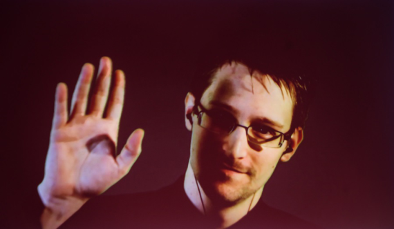 Edward Snowden is seen on the screen during a live remote interview at CeBIT 2015 in Hanover, Germany, on March 18, 2015.