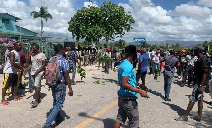 Demonstrators in front of the Antoine Simon airport, Les Cayes, Haiti, March, 2022.