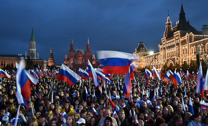 People celebrating the annexation of the new territories, Moscow, Russia, Sept. 30, 2022.