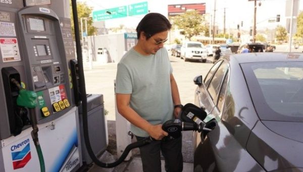A man fuels his vehicle at a gas station in Los Angeles, California, the United States, June 1, 2022.