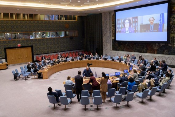 UN Special Envoy for Syria Geir Pedersen (R, on the screen) speaks via a video link at a Security Council meeting on the situation in Syria, at the UN headquarters in New York, on April 26, 2022.
