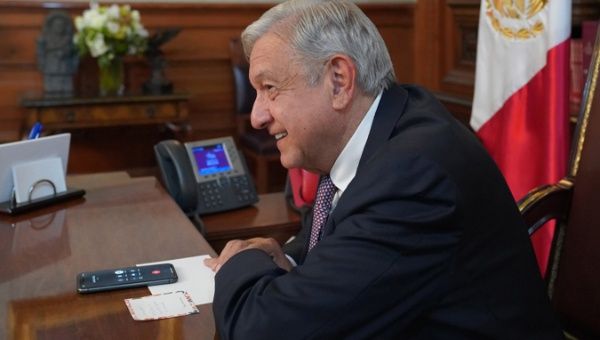 Photograph provided today by the Mexican Presidency showing Mexican President Andrés Manuel López Obrador during a phone call to Luiz Inácio Lula da Silva at the National Palace of the City of Mexico