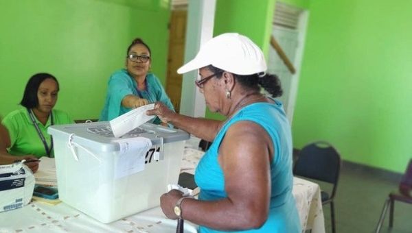 A citizen casts her vote, Dominica, Dec. 6, 2022.