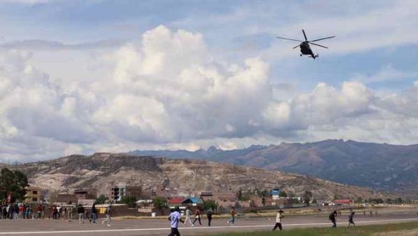 Dozens of people enter the Ayacucho airport during protests today, in Ayacucho