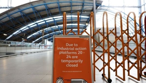 A notice of strike is seen in Waterloo Station in London, Britain, on Aug. 20, 2022.