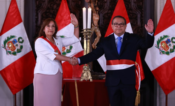 Peruvian President Dina Boluarte (L) and Luis Alberto Otarola (R), Dec. 21, 2022,