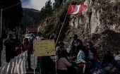 Protesters block the road over the Combapata bridge, Cuzco, Peru, Jan. 5, 2023.