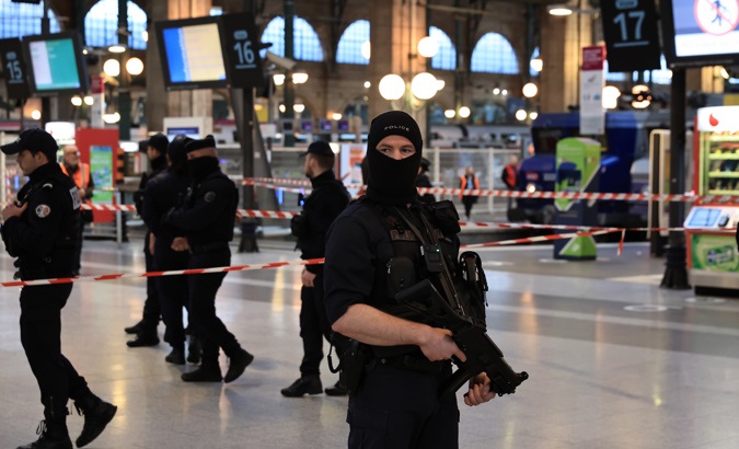 Police officers patrol the Gare du Nord train station after the knife attack, Paris, France, Jan. 11, 2023.