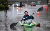 A woman amid a flood in Pleasant Hill, California, U.S., Dec. 31, 2022.