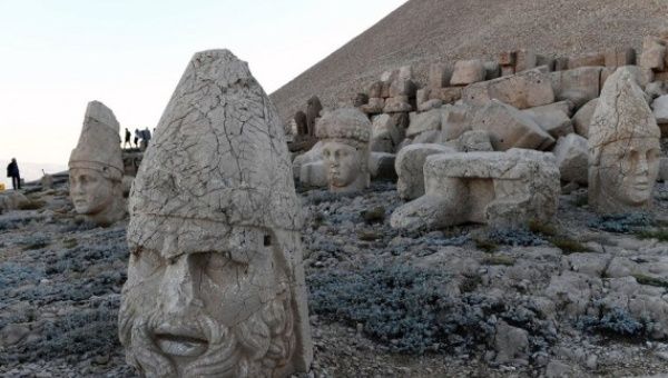 People visit the tomb-sanctuary on Mount Nemrut, a UNESCO World Heritage site in Adiyaman Province, Türkiye, on June 7, 2022.