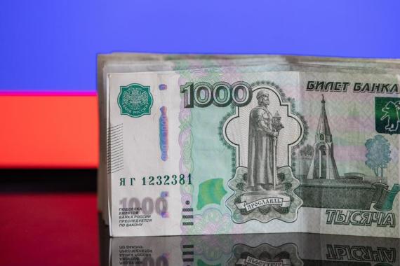 Photo taken on March 24, 2022 shows ruble banknotes in Moscow, capital of Russia.