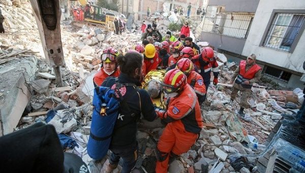 Rescuers transfer an earthquake survivor in Antakya, Türkiye, Feb. 12, 2023.