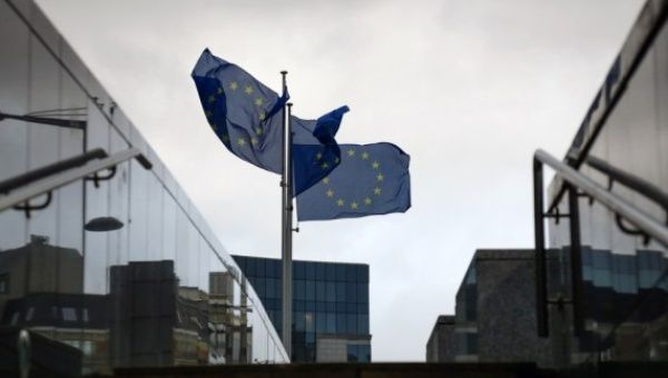 EU flags are seen outside the European Commission in Brussels, Belgium, Jan. 6, 2023.