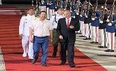 President Luis Arce (L) arrives in Venezuela to take part in the initiatives to remember the 10th anniversary of Commander Hugo Chavez, Caracas, Venezuela, March 4, 2023.