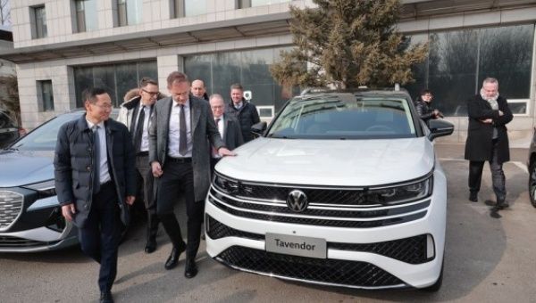 Oliver Blume (3rd L), chairman of the Board of Management of Volkswagen AG, visits China FAW Group Co., Ltd. in Changchun, northeast China's Jilin Province, on Jan. 31, 2023.