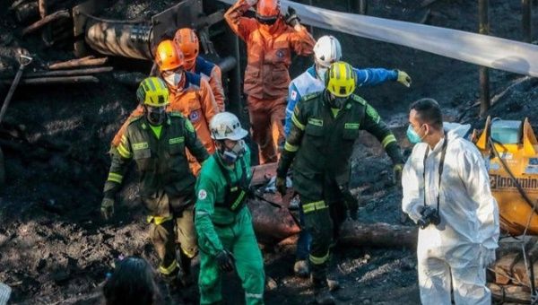 Rescuers help in relief efforts, Cundinamarca, Colombia, March 15, 2023.