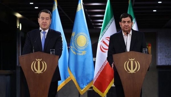 Iran's First Vice President Mohammad Mokhber (R) and Kazakh Prime Minister Alikhan Smailov. Apr. 27, 2023