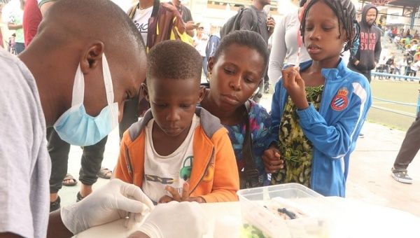 People queue for a free malaria test in Lagos, Nigeria, 2022