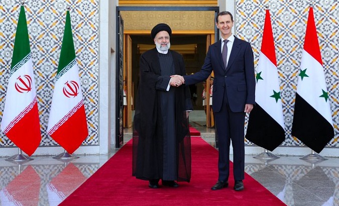 Iranian President Ebrahim Raisi (L) and Syrian President Bashar al-Assad (R), 2023.