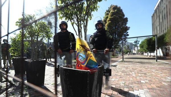Soldiers make a fence around the National Assembly in Quito, Ecuador, May 17, 2023.