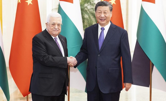 Palestinian President Mahmoud Abbas (L) & Chinese President Xi Jinping (R), June 14, 2023.