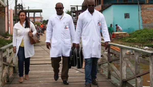 File photo of Cuban doctors in a Brazilian slum.