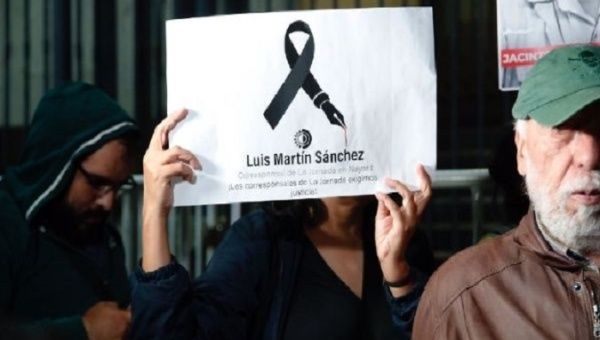 Sign claiming justice for Luis Martín Sánchez Íñiguez. Jul. 11, 2023.