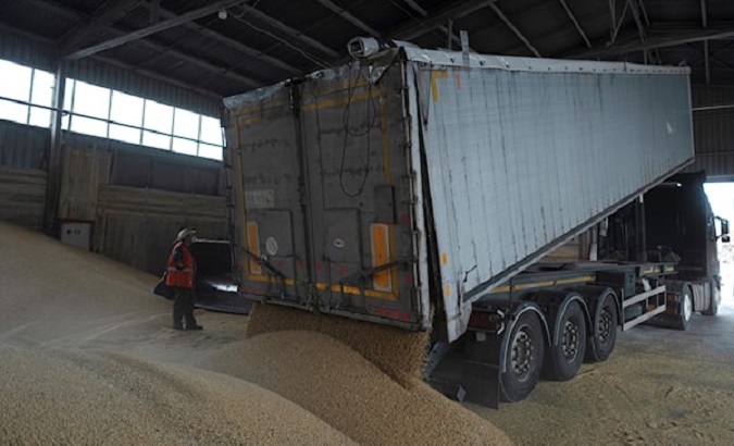 A truck unloading grain in Izmail, Ukraine, 2023.