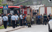 Rescuers are seen at the blast site of a plant in Moscow, Russia, Aug. 9, 2023. 