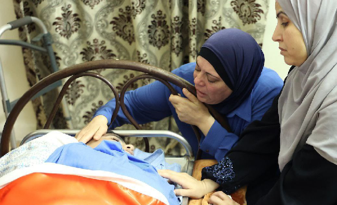 Palestinian mother bids the last farewell to Qusai Al-Walaji, Aug. 15, 2023.